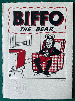 Biffo watches telly from his comfy chair