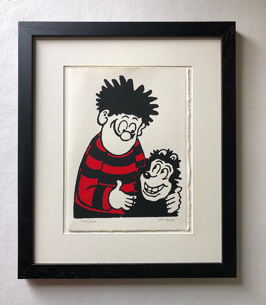 A smiley Dennis the menace hugs Gnasher. From the Beano Comic