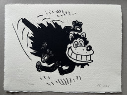 Dennis's dog Gnasher runs at full pelt, his hind legs high, his grin wide
