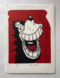 Gnasher from the Beano comic grins and shows off his enormous teeth. On red background. 