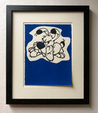 A grumpy Dogmatix holds his head in his paws. Black ink on blue background. Cotton paper milled in England