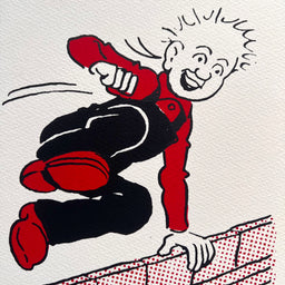 Oor Wullie gleefully vaults a wall