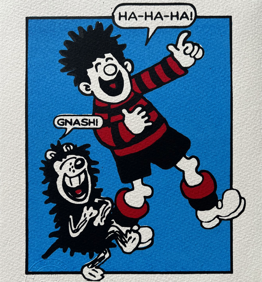 Dennis and Gnasher find something hilarious