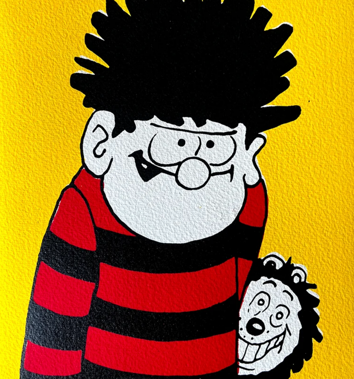 Gnasher hides behind Dennis
