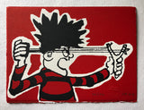 dennis menace from the beano comic in red and black jersey fires his catapult on a red background. 
