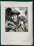 A British soldier in a green tunic and metal helmet has a grenade in each  hand and says: This looks like a job for a couple of grenades. From The Victor comic. Approved by publisher DC Thomson 