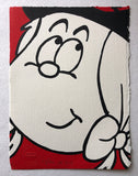 A closeup of Minnie the Minx in a red and black striped jersey and a Tam o' Shanter bonnet, with a red woolen ball on top. She's looking innocent