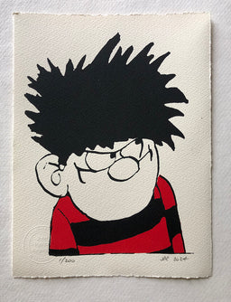 A glaring Dennis the Menace from the Beano comic in spikey hair and red and black jersey.